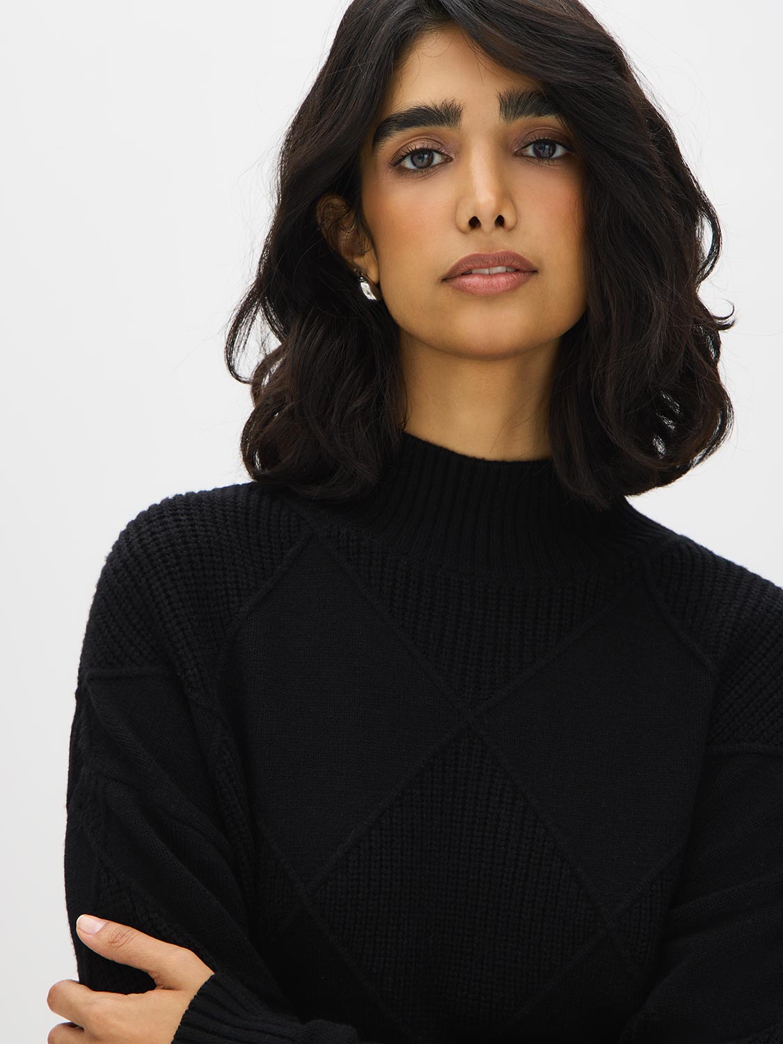 Black Mock Neck Sweater with Diamond Pattern - Close-up Fabric Detail - Suzy Shier