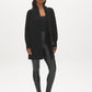 Black Faux Leather Wide Waistband Leggings - Woman Wearing Sleek Pull-On Leggings - Suzy Shier