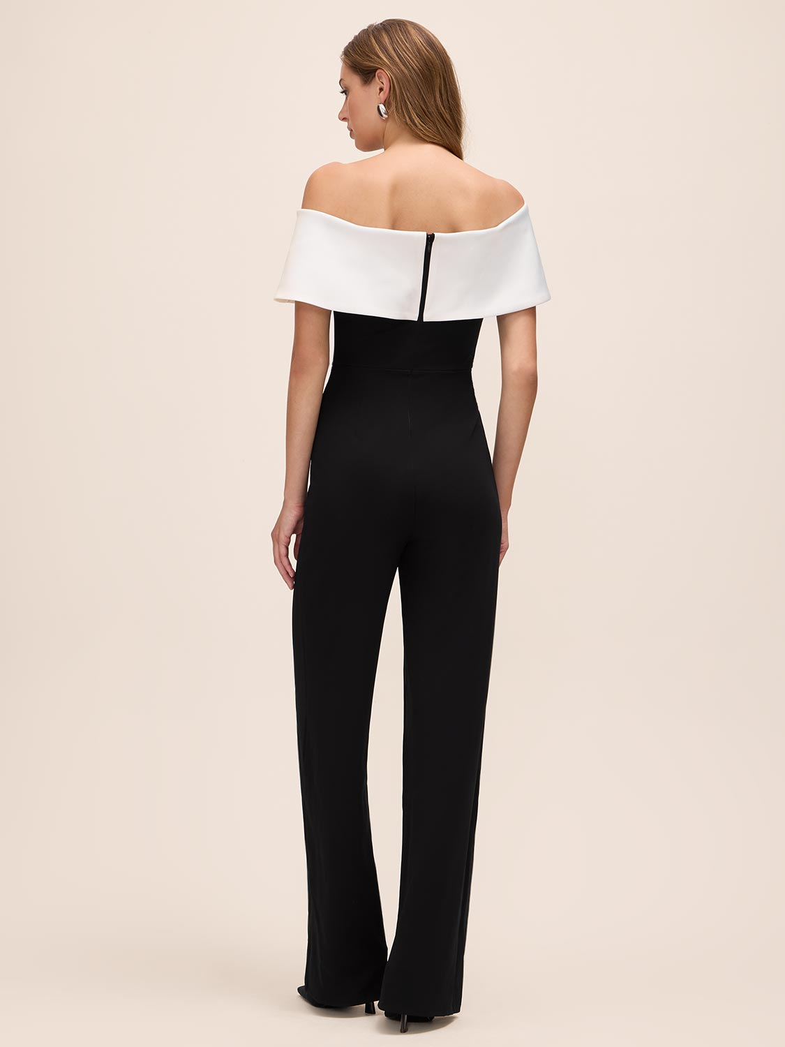 Black/White Asymmetrical Off-Shoulder Knit Jumpsuit - Back View - Le Chateau