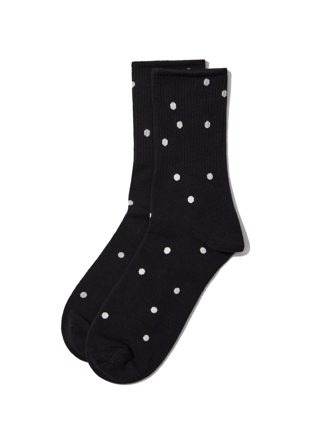 Black and White Polka Dot Socks - Close-Up of Patterned Knit Fabric - Suzy Shier