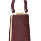 Black/Gold Faux Leather Croc Minaudire with Jewel Bow - Side Profile View - Le Chateau