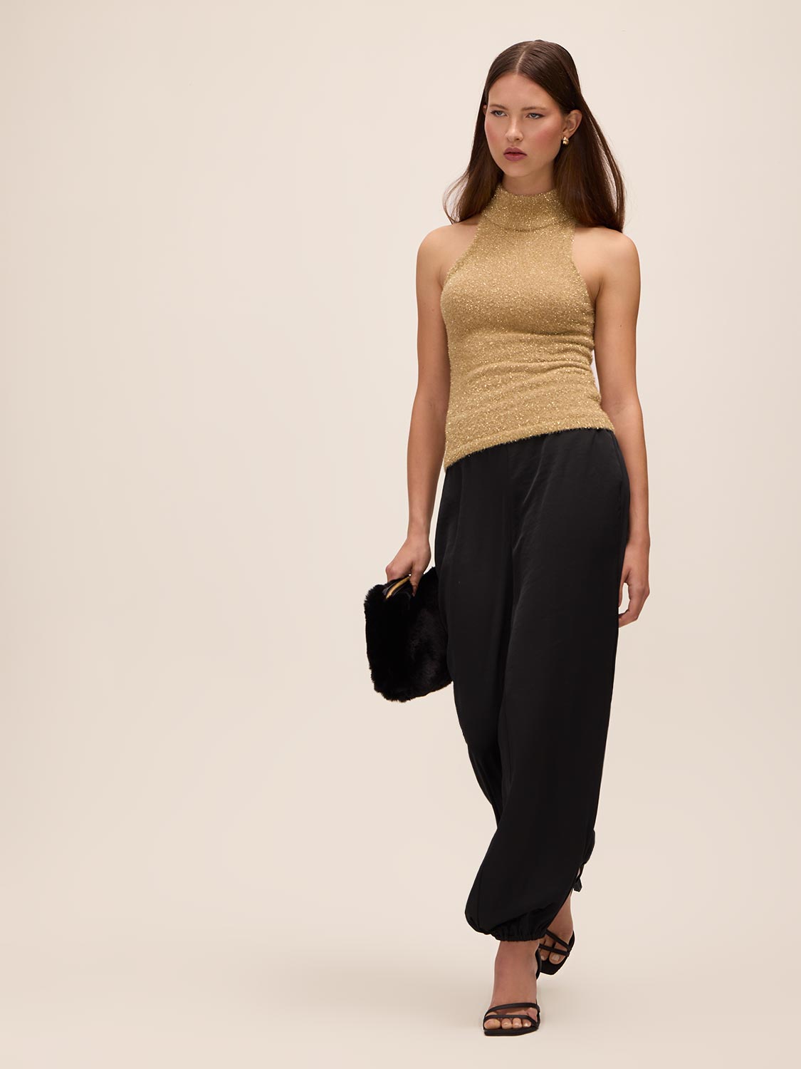 Gold Sleeveless Tinsel Lurex Knit Sweater - Full Body View - Le Chateau
