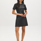 Jet Black Mini Faux Leather Dress with Belted Waist - Woman Wearing Short Sleeve Dress - Suzy Shier