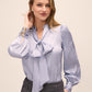 Steel Blue Floral Damask Tie Neck Bow Blouse - Side Profile View - Le Chateau
