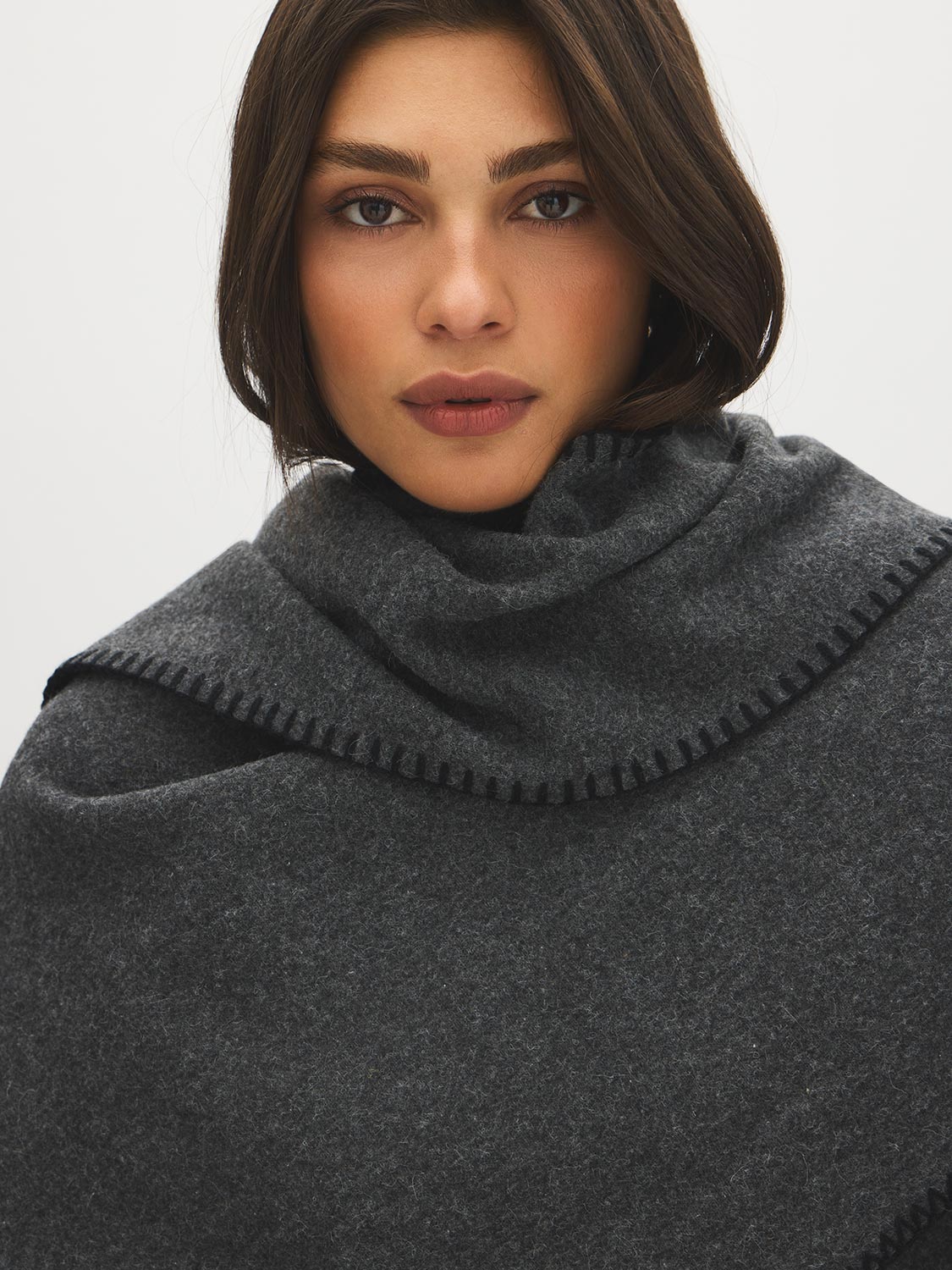 Grey Melange Woven Cape with Contrast Scarf - Close-up Fabric Detail - Suzy Shier