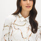 Snow White Button-Up Knit Blouse with Shirt Collar - Close-up Fabric Detail - Suzy Shier