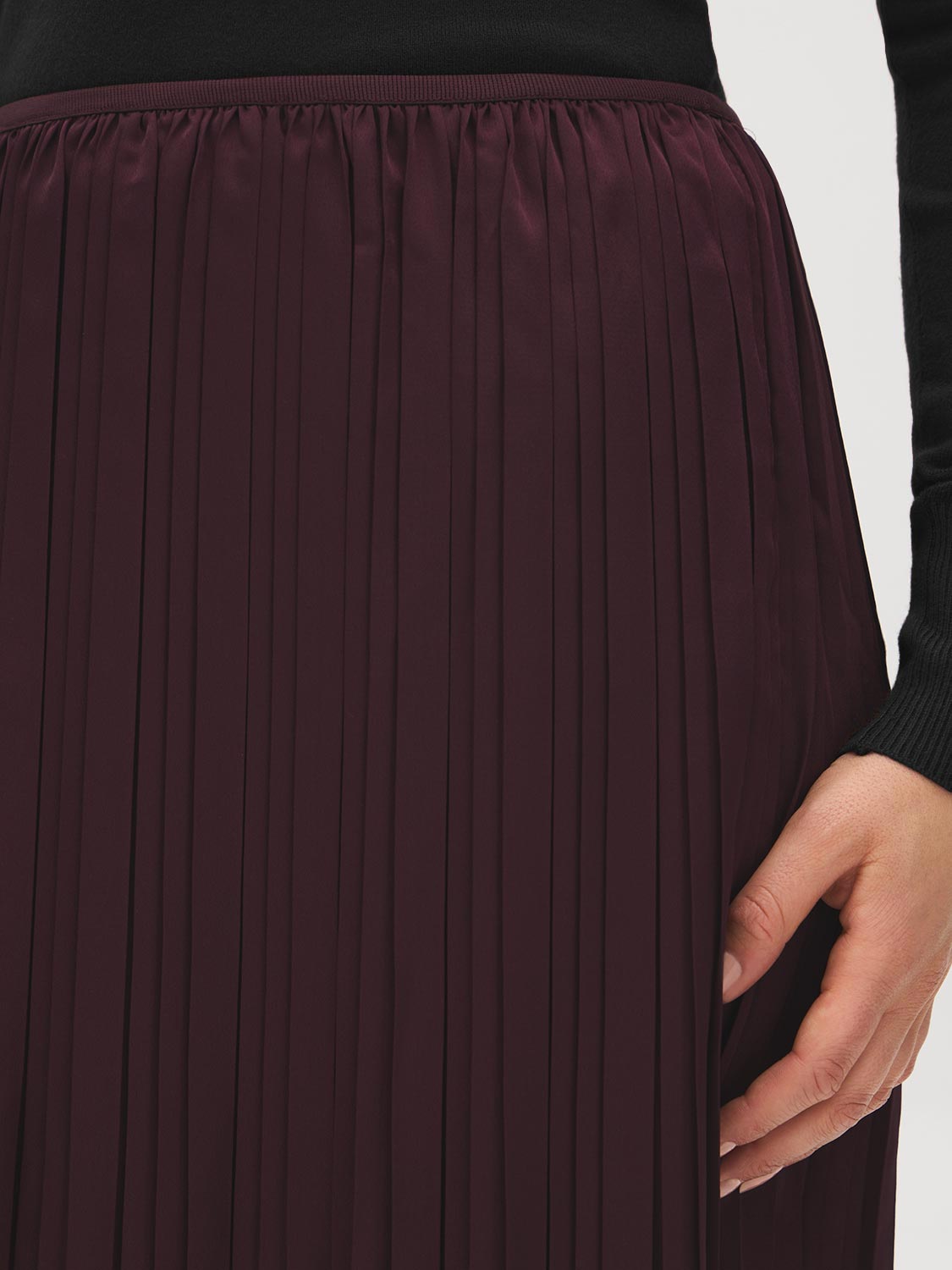 Winetasting Pleated Satin-Like Skirt with Lace Hem - Close-up Fabric Detail - Suzy Shier