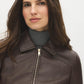 Brown Vegan Leather Shorts with Front Zipper - Close-up Collar Detail - Suzy Shier