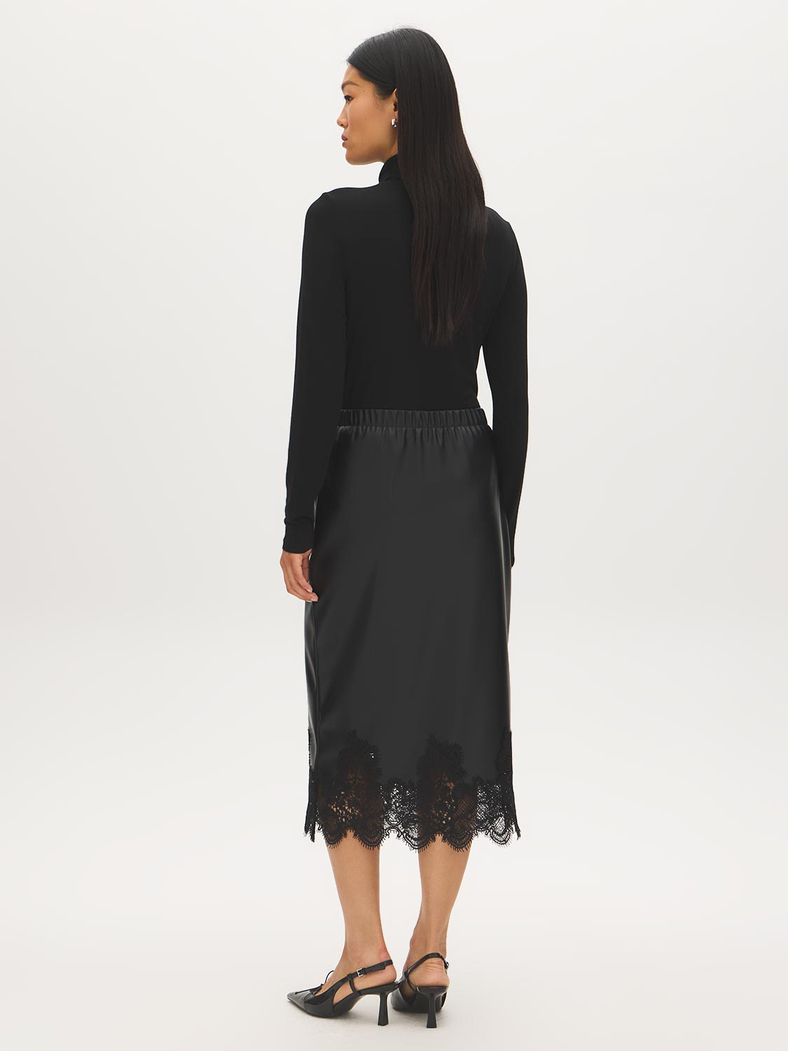 Black Faux Leather Midi Skirt with Lace Hem - Back View - Suzy Shier