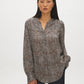 Gardenia Abstract Herringbone V-Neck Tunic Blouse - Woman Wearing Textured Satin-Like Blouse - Suzy Shier